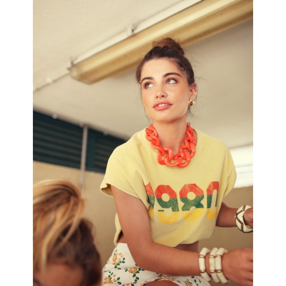 Camiseta amarilla 1980